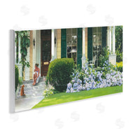 Heide Presse | Woman on Front Porch Blue Hydrangeas