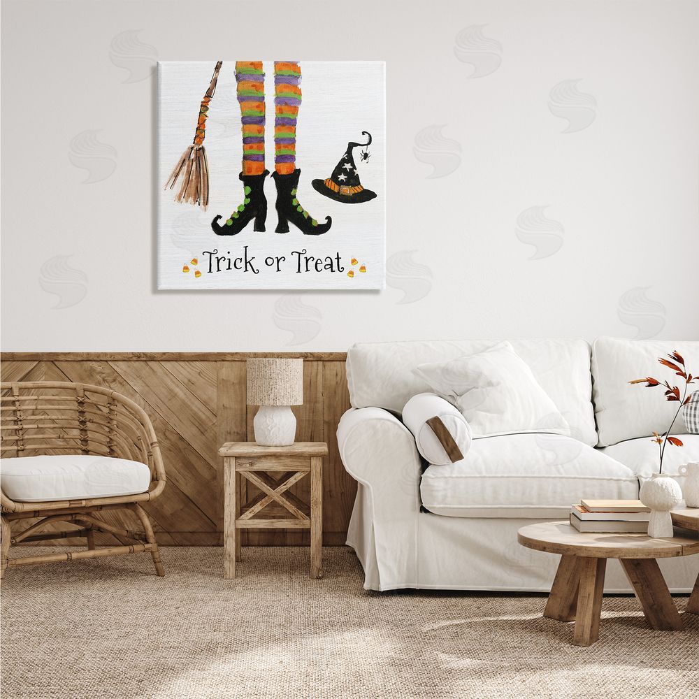 Sally Swatland Trick Or Treat Phrase Whimsical Striped Witch Socks Canvas Wall Art in Room