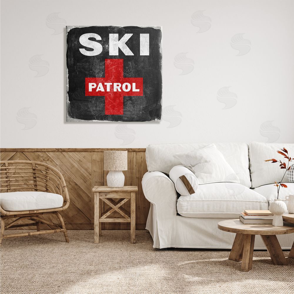 Lady Louise Designs Ski Patrol Sign Red Cross Symbol Rustic Black Canvas Wall Art in Room