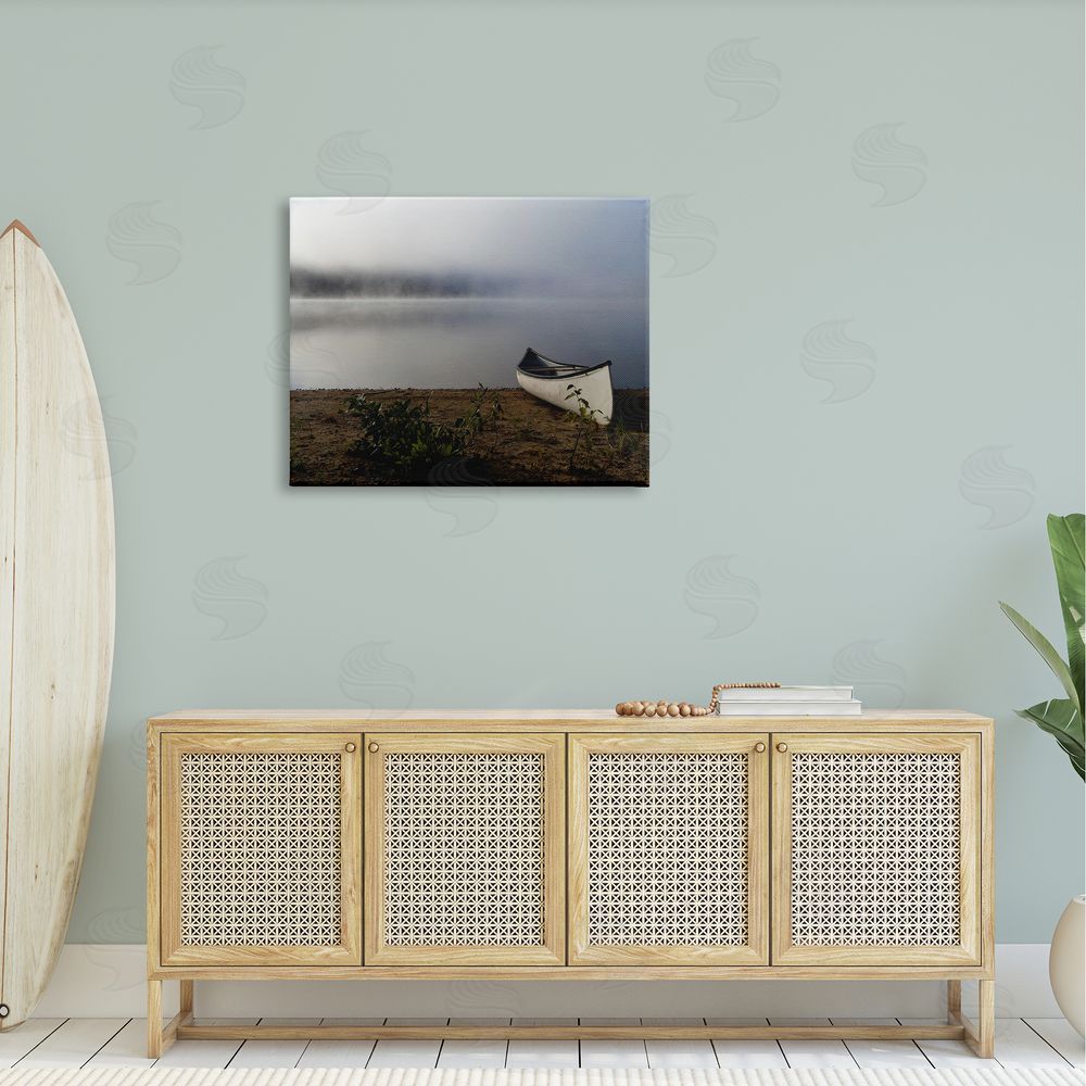 Stupell Studio Lone Canoe Tranquil Foggy Lake Beach Weather Canvas Wall Art Print in Room