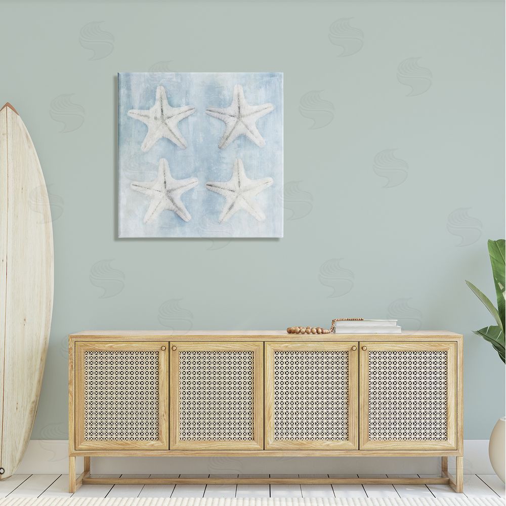Nina Blue Aquatic Starfish Soft Blue Coastal Canvas Wall Art in Room