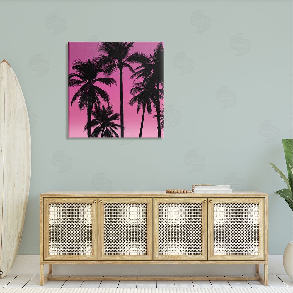 Mia Jensen Pink Tropical Sunset Palm Trees Canvas Wall Art in Room
