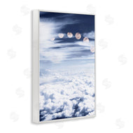 Sundance Group | Moon Phases Over Clouds