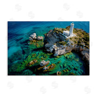 Don Schwartz | Lighthouse with Seaside Rocks