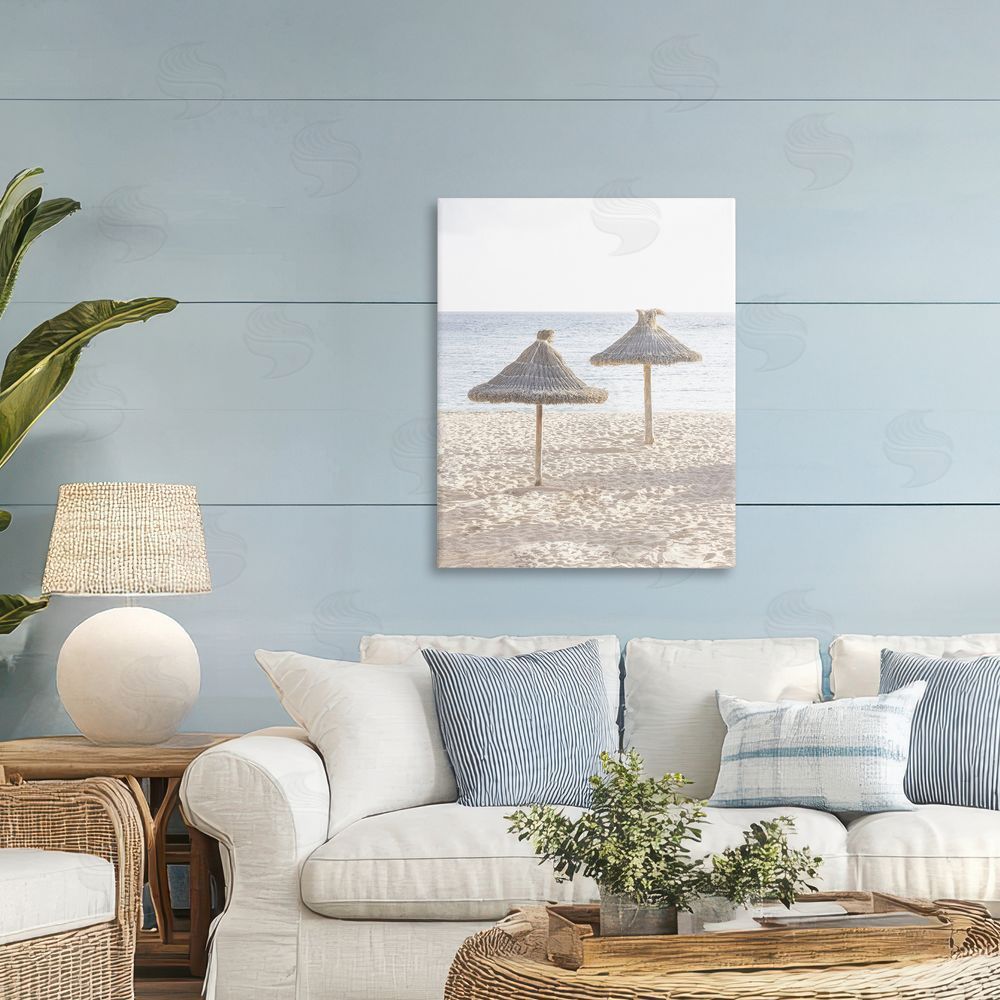 Sisi and Seb Straw Umbrellas on Beach Printed Wall Art in Room