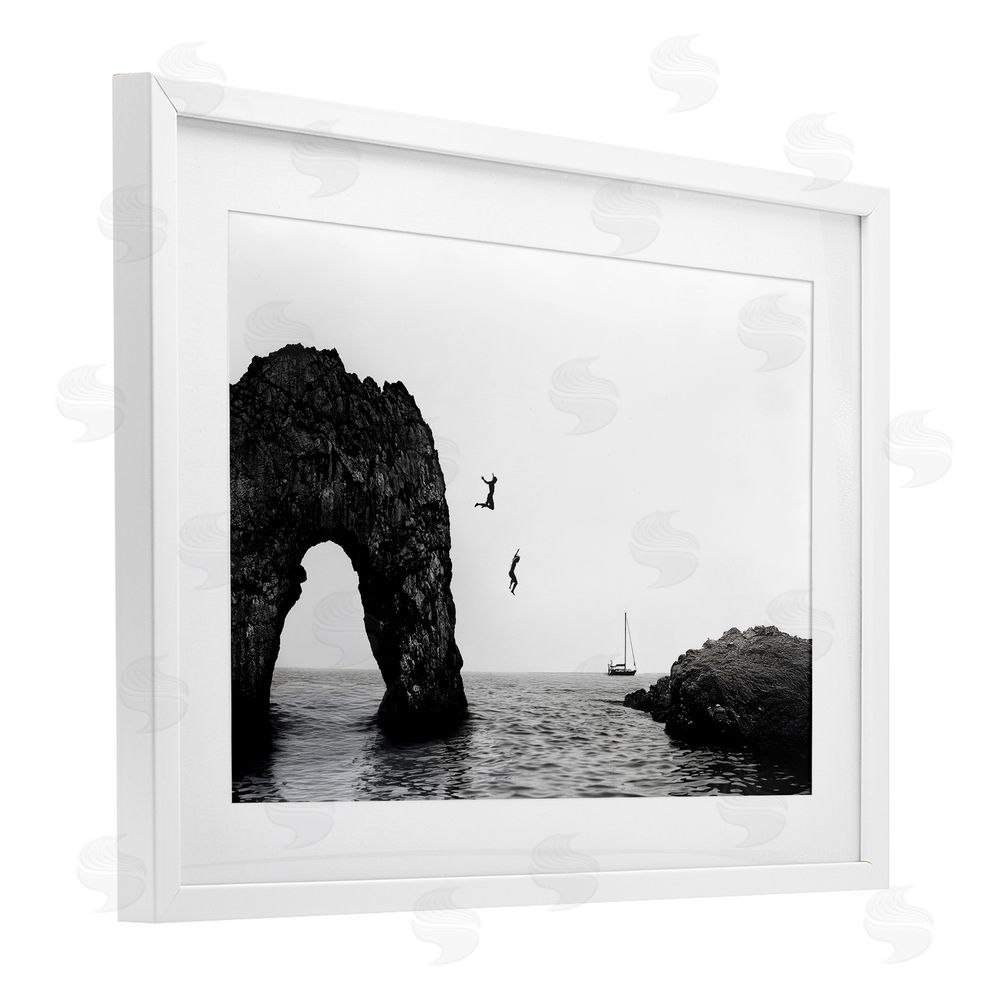 Sisi and Seb Cliff Jumping into Sea White Framed Print Under Glass Art