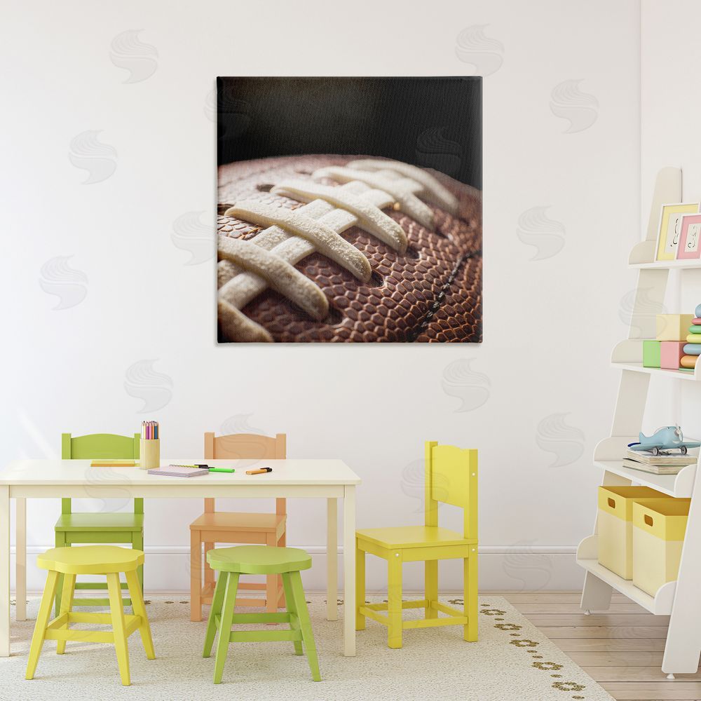 Kim Allen Football Closeup On Black Printed Wall Art in Room