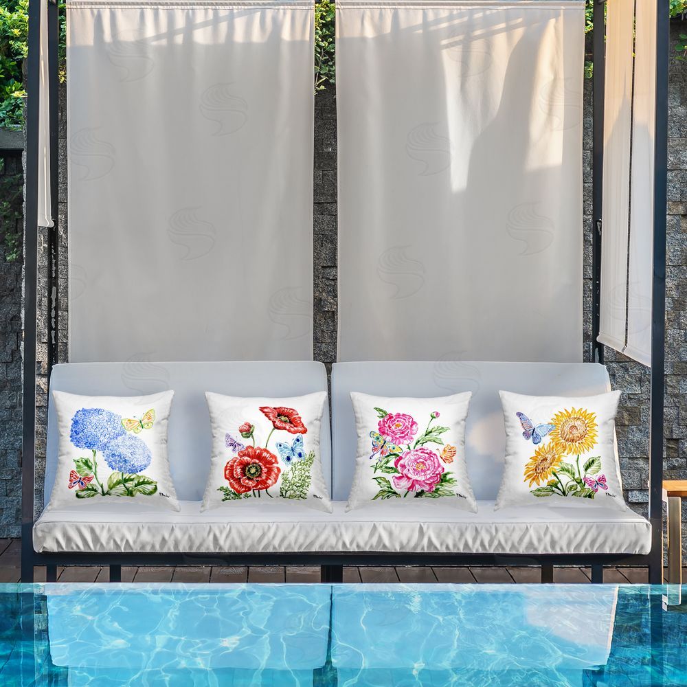 Paul Brent Brushstroke Florals & Butterflies Outdoor Pillow Set on Patio