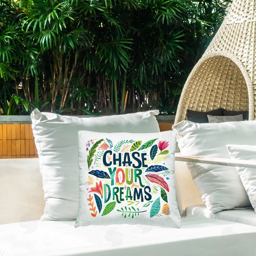 Lettered and Lined Chase Your Dreams on Leaves Outdoor Square Pillow on Patio