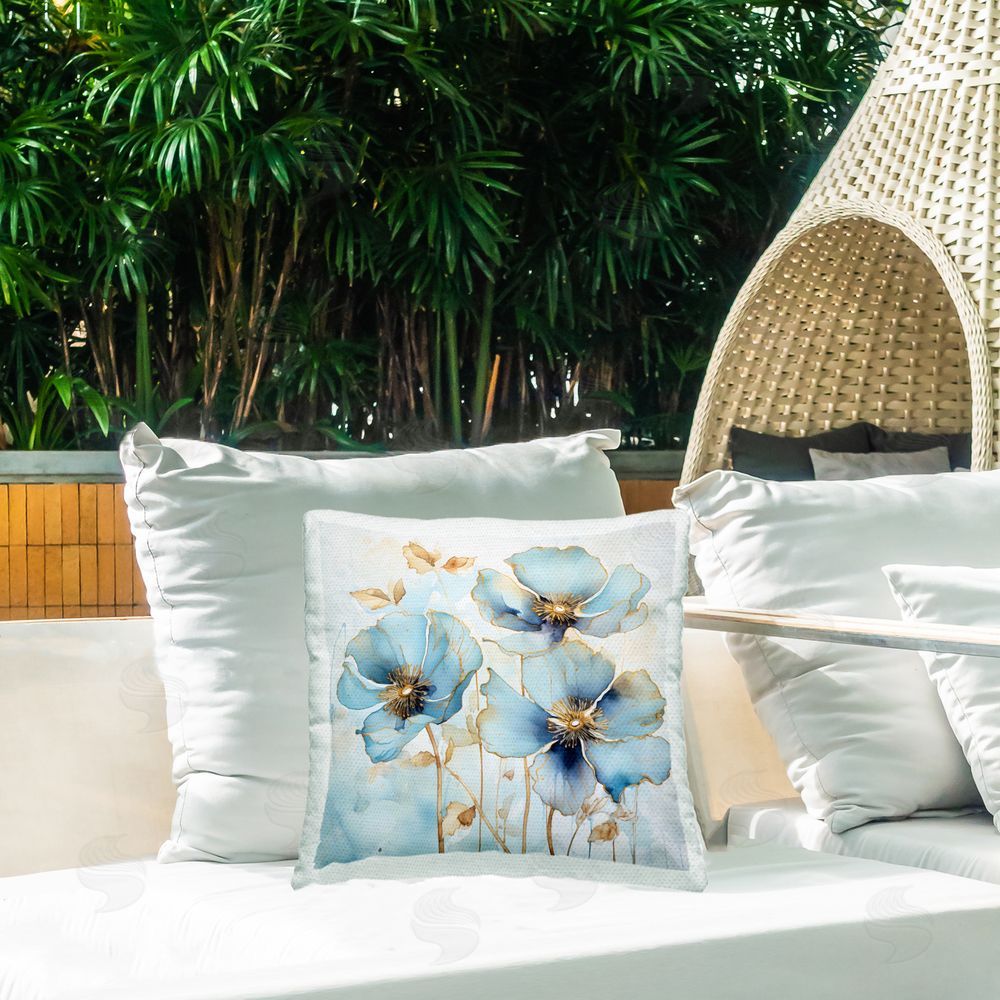 Creative Studio Sapphire And Gold Florals Outdoor Square Pillow on Patio