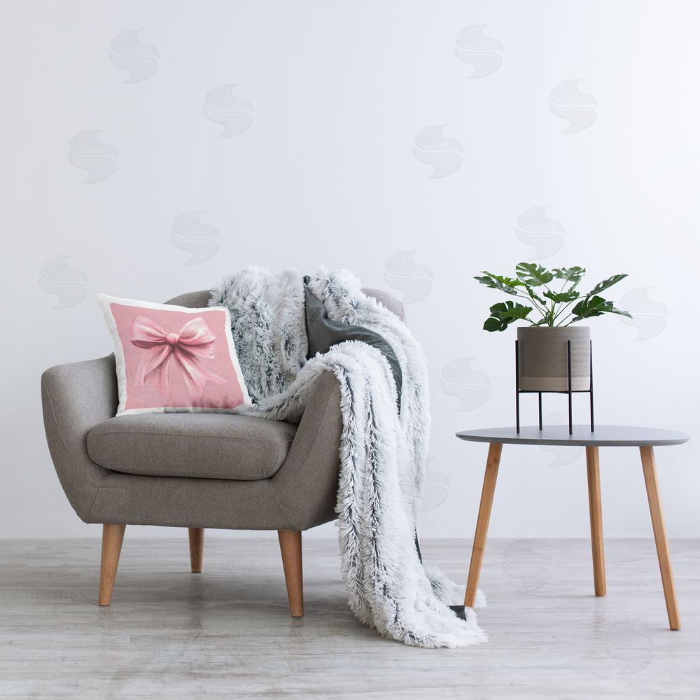 Creative Studio Big Pink Bow with Speckles Indoor Square Pillow on Chair