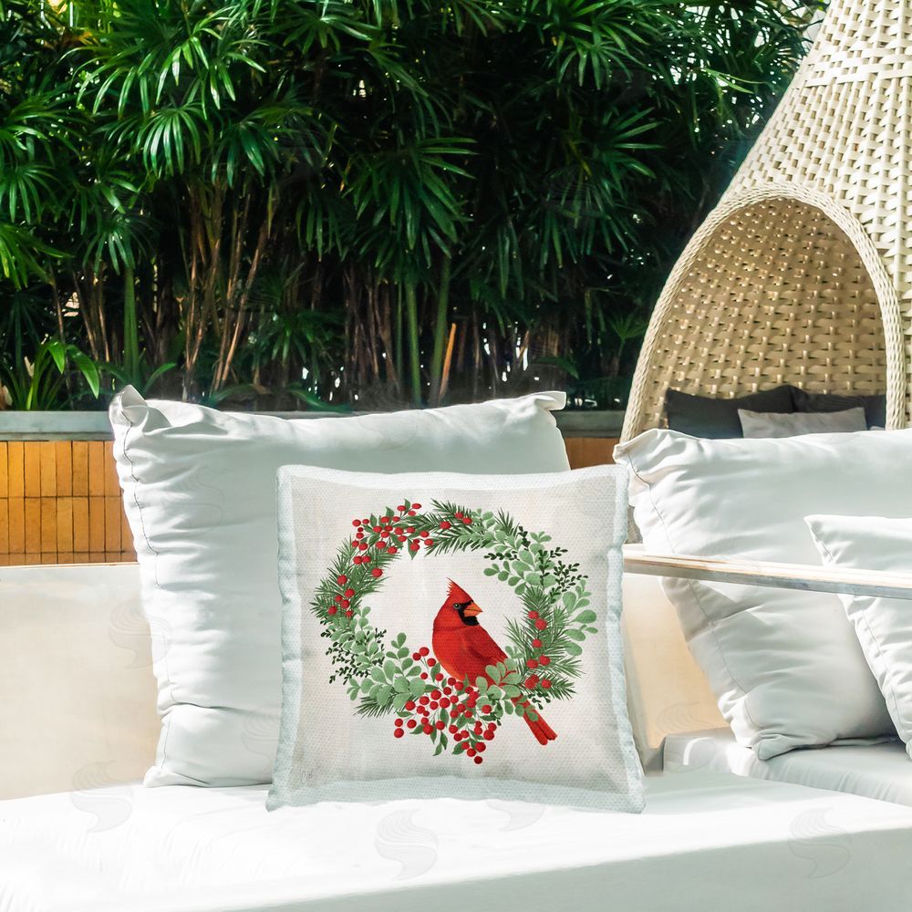 Cat Thurman Designs Perched Cardinal Festive Wreath Outdoor Square Pillow on Patio