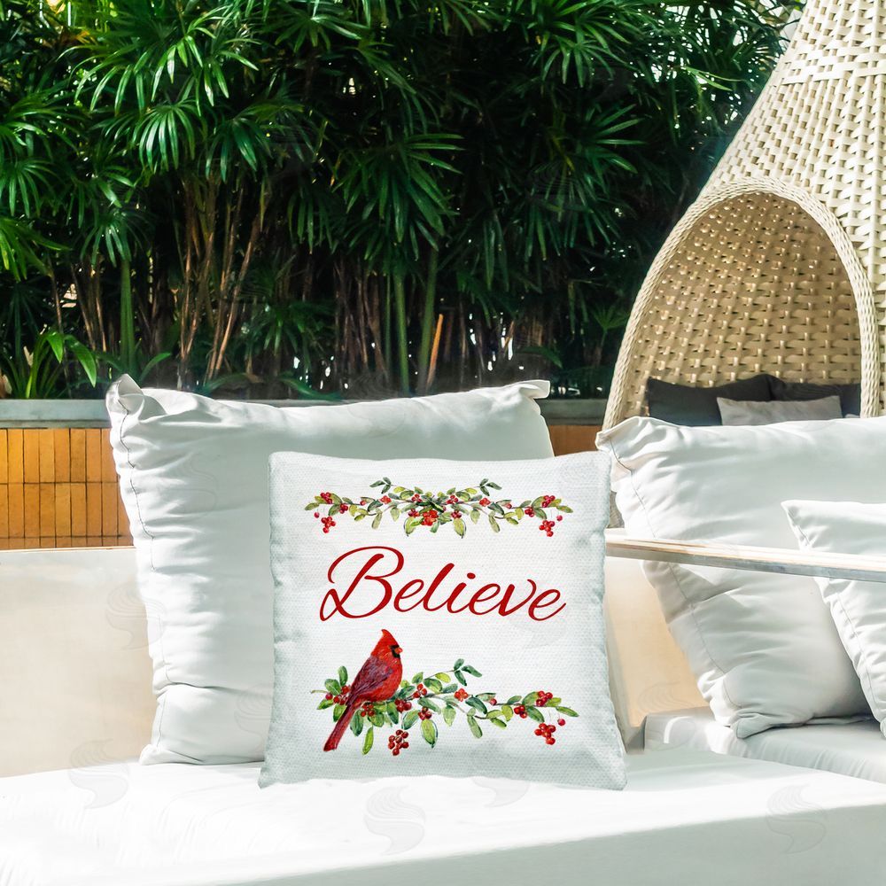 Sally Swatland Festive Believe Greenery Outdoor Square Pillow on Patio