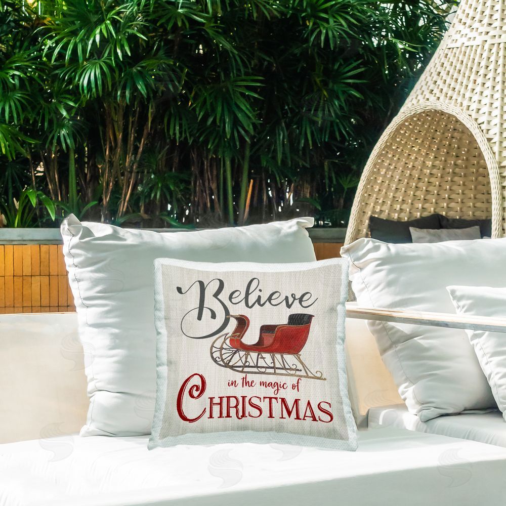 Charity Henderson Believe Magic Of Christmas Outdoor Square Pillow on Patio